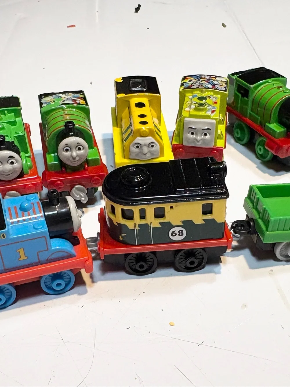 collection of die-cast train engines from the Thomas & Friends Take-n-Play